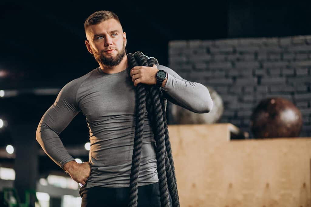 Handsome Man Exercising At The Gym