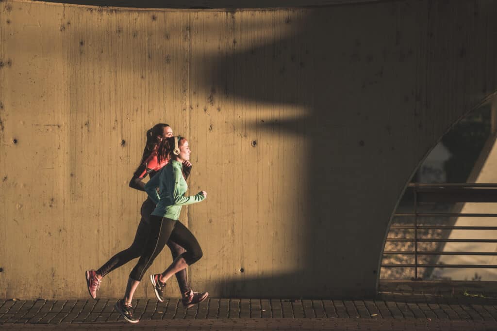 Healthy Women Enjoying Sport Sunset